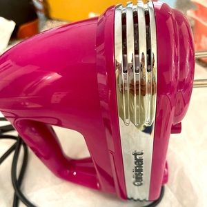 Practically new, berry colored Cuisinart hand mixer with beaters.